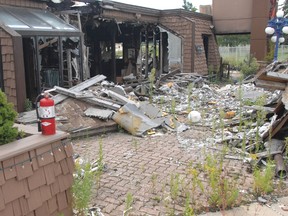 Debris still littered the site of Woodstock?s Iron Grill in 2010, a year after an explosion and fire razed the restaurant. (Postmedia Network file)