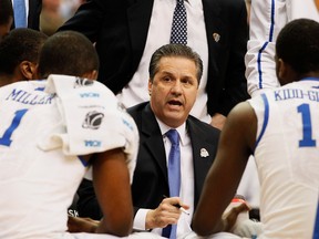 Kentucky Wildcats head coach John Calipari talks to Doron Lamb (20) during their game against the Baylor Bears Saturday at the Georgia Dome. (GETTY IMAGES)