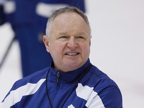 Leafs coach Randy Carlyle held a closed door meeting with his players before practice Wednesday. The club has lost a club-record 10 consecutive games at the ACC. (CRAIG ROBERTSON/Toronto Sun)