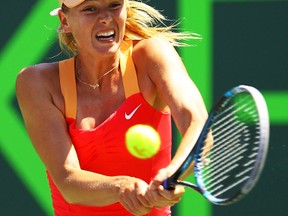Maria Sharapova of Russia in action against Caroline Wozniacki of Denmark during Day 11 at Crandon Park Tennis Center in Key Biscayne, Florida. (Al Bello/Getty Images/AFP)