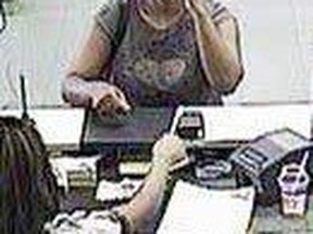 Toronto Police are looking for this woman in connection with the robbery of two banks on June 19, 2009.
