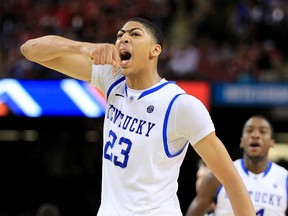 Wildcats forward Anthony Davis celebrates after the Wildcats defeated the Louisville Cardinals in their men's NCAA Final Four semi-final college basketball game in New Orleans.