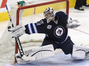 Pavelec was the Jets's most valuable player this year. He struggled down the stretch, which was probably because he just plain wore out. (JASON HALSTEAD/Winnipeg Sun files)