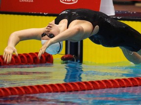 Sinead Russell swims to win the women’s 200-metre backstroke finals at the Canadian Olympic swimming trials in Montreal yesterday.
