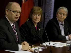 The Gay Straight Alliance Coalition lawyer Doug Elliott, left, Marilyn Byers, middle, chair of Ontario GSA coalition and coalition member Helen Kennedy speak to the media. (Jack Boland / Toronto Sun)