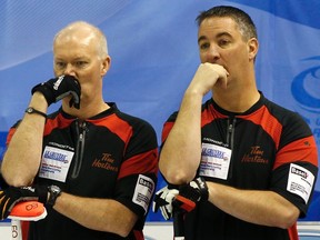 Canada vice-skip Wayne Middaugh and skip Glenn Howard (L) play against New Zealand at the World Men's Curling Championship 2012 in Basel April 5, 2012.  (REUTERS/Arnd Wiegmann)