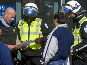 Demonstrators managed to enter Education Minister Line Beauchamp’s riding office in Montreal's north end on Friday morning. (CHANTAL POIRIER/QMI Agency)