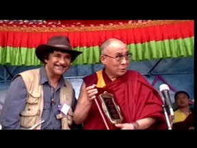 QMI Calgary--A video grab of Ashid Bahl,president of Alberta's For the Love of Children Society with the Dalai Lama.