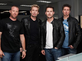 Rock band Nickelback (left to right) Mike Kroeger, Chad Kroeger, Ryan Peake, and Daniel Adair will perform at the NHL Awards show in June. (Cindy Ord/Getty Images/AFP)