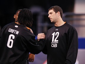 Quarterbacks Andrew Luck of Stanford and Robert Griffin III of Baylor meet during the 2012 NFL Combine at Lucas Oil Stadium. (Joe Robbins/Getty Images)