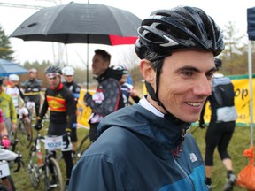 Mike Garrigan, last year's overall winner of the Paris to Ancaster Bicycle Race, gives a TV interview shortly before the start of the race's 19th edition on Sunday, April 15, 2012. MICHAEL PEELING/THE PARIS STAR/QMI AGENCY