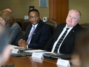 Mayor Rob Ford, right, with Councillor Michael Thompson, at a roundtable discussion with Toronto's small business leaders Tuesday. (Stan Behal/Toronto Sun)