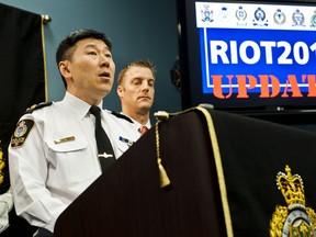 Vancouver Police Chief Jim Chu announces charges that have been recommended to Crown at a press conference in Vancouver, BC. OCT. 31, 2011. (QMI Agency/Carmine Marinelli)