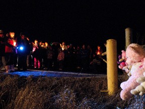 Lloydminster and area residents gathered at the Lloydminster Landfill on Thursday, Dec. 1 to hold a candlelight vigil for the baby whose remains were found there last week. (QMI Agency/Justina Contenti)