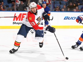 Tyson Strachan #23 of the Florida Panthers skates with the puck against the New York Islanders during their game on February 12, 2012 at the Nassau Coliseum in Uniondale, New York.  (Al Bello/AFP)