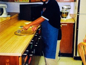 George Zimmerman is pictured making a pizza in a home economics class at Osbourn High School in Manassas, Virginia in 2000 in this handout photo obtained by Reuters April 25, 2012. (REUTERS/Zimmerman Family/Handout)