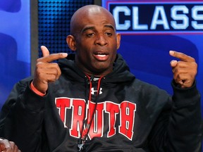 Deion Sanders has been charged with simple assault on Thursday, days after his estranged wife was also arrested. (Lucy Nicholson/Reuters/Files)