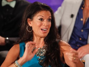 E! cable channel reality series "Mrs. Eastwood and Company" cast member Dina Eastwood, wife of director Clint Eastwood, answers a question during a panel discussion at the NBC Universal Summer Press Day 2012 in Pasadena, California April 18, 2012. (REUTERS/Fred Prouser)