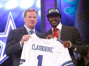 LSU's Morris Claiborne holds up a jersey as he stands with NFL Commissioner Roger Goodell after being selected by the Cowboys as the sixth overall pick in the NFL Draft in New York on April 26, 2012. (Shannon Stapleton/Reuters)