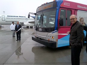 Mayor Stephen Mandel celebrates at the Edmonton International Airport Friday after the city unveiled a new transit service. (TANARA MCLEAN PHOTO)