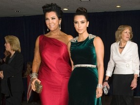 Socialite Kris Jenner (L) and her daughter Kim Kardashian arrive on the red carpet for the annual White House Correspondents’ Association Dinner at the Washington Hilton in Washington April 28, 2012. REUTERS/Jonathan Ernst