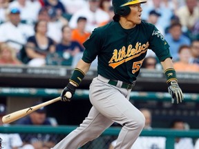 Oakland Athletics' Hideki Matsui watches his one RBI single against the Detroit Tigers during the third inning of their MLB American League baseball game in Detroit, Michigan July 20, 2011. (REUTERS/Rebecca Cook)