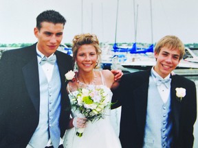 This family photo, supplied by the Roke family, shows Matthew, left, who was shot dead by police on Wednesday in Maitland. He is with his sister Erin Nymann on her wedding day and younger brother Isaac Roke. (Photo courtesy Roke family)