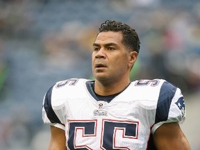 Junior Seau of the New England Patriots jogs on the field before the game against the Seattle Seahawks on December 7, 2008 at Qwest Field in Seattle, Washington. (Otto Greule Jr/Getty Images/AFP)