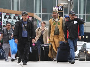 The Freedom Train arrived at Union Station Tuesday carrying protesters — including Hereditary Chief Pete Erickson — with plans to rally outside a meeting by Enbridge, a company that plans to build a pipeline from Alberta to British Columbia.  (Stan Behal Photo/Toronto Sun)