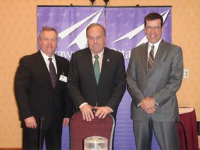 From left to right, Gilles Lalonde, incoming chairman of the board, Paul Benoit, CEO and President of Ottawa Airport Authority, and Raymond Brunet, past chairman of the board. Ottawa Airport Authority released its 2011 results at the annual public meeting Tuesday afternoon. Passenger volumes set a record with over 4.6 million people traveling through the airport in 2011, and revenues were 15% higher than in 2010.