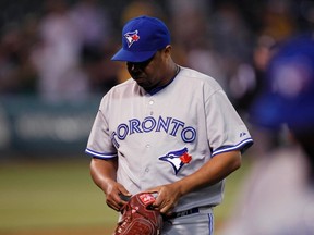 Francisco Cordero, walking off the mound after giving up a game-lsoing grand slam on Tuesday night, has been relieved of his interim closer's duties. (Reuters)