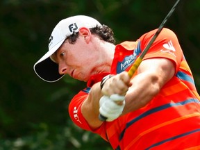 Rory McIlroy hits his tee shot on the 12th hole during the third round of the Wells Fargo Championship in Charlotte, N.C., May 5, 2012. (CHRIS KEANE/Reuters)