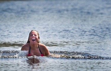 Madison McCausland takes advantage of the great weather by taking a dip at Westboro Beach on May 7, 2012. (DARREN BROWN/QMI Agency)