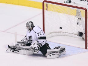 Goaltender Jonathan Quick, of the Los Angeles Kings, fails to make the save on a shot from centre ice by Derek Morris, of the Phoenix Coyotes (not in photo), for a goal in the first period in Game 1. (GETTY)