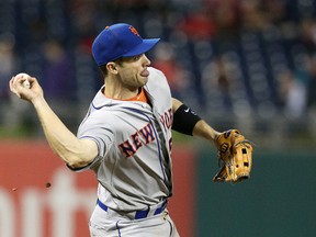 Third baseman David Wright of the New York Mets throws to first during a game against the Philadelphia Phillies at Citizens Bank Park on May 8, 2012 in Philadelphia, Pennsylvania. (Hunter Martin/Getty Images/AFP)