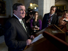 Finance Minister Jim Flaherty commented on the second reading vote of the Jobs, Growth and Long-Term Prosperity Act and the state of the global economy, during a press conference in Ottawa, May 14, 2012.      (Chris Roussakis/QMI Agency)