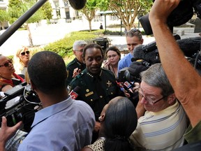 Sheriff Jerry Demings speaks in front of the Ninth Judicial Court in Orlando, Florida. May 2, 2012. Thirteen people have been charged in relation to the hazing death of Robert Champion. REUTERS/Octavian Cantilli
