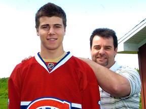 Nathan Beaulieu with his father Jacques. (QMI AGENCY)