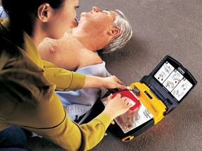 As of Jan.1, 2014, the Manitoba provincial government is making it mandatory for all AEDs (automated external defibrillators) to be registered with the Heart and Stroke Foundation. (QMI file photo)