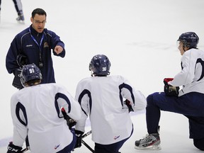Cataractes head coach Eric Veilleux gives instructions to his players during practice at Gilles Bourassa Arena in Shawinigan, Que., May 16, 2012. (DIDIER DEBUSSCHERE/QMI Agency)
