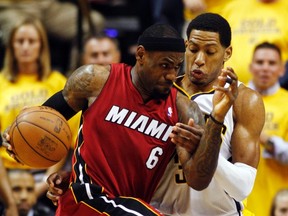 Heat forward LeBron James is guarded by Pacers forward Danny Granger during Game 3 of their NBA Eastern Conference semifinal series at Bankers Life Fieldhouse in Indianapolis, Ind., May 17, 2012. (BRENT SMITH/Reuters)
