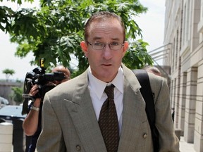 Brian McNamee, former trainer of Major League Baseball pitcher Roger Clemens, leaves the federal courthouse in Washington May 16, 2012. (REUTERS/Yuri Gripas)