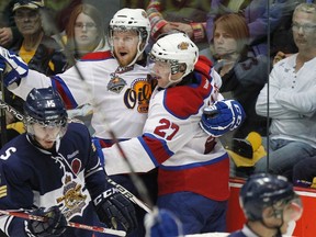 Edmonton Oil Kings' Griffin Reinhart celebrates with his teammate Curtis Lazar after he scored against the Shawinigan Cataractes during the third period of their round-robin Memorial Cup ice hockey game in Shawinigan, Quebec May 18, 2012. (Mathieu Belanger/REUTERS)