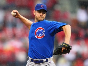 Reliever Kerry Wood of the Chicago Cubs pitches against the St. Louis Cardinals during the home-opening game at Busch Stadium on April 13, 2012 in St. Louis. Wood announced his retirement May 18, 2012. Dilip Vishwanat/Getty Images/AFP