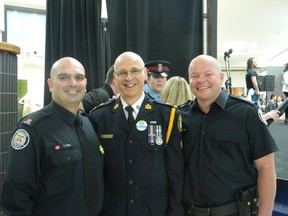 Const. Tony Vella, Deputy Chief Mike Federico and Staff Sergeant Chris Boddy have a big heart and no hair.