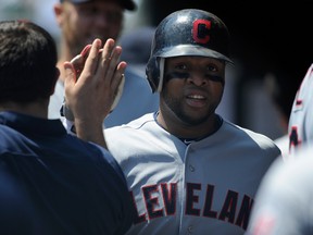 Carlos Santana of the Cleveland Indians celebrates scoring against the Minnesota Twins during the second inning on May 15, 2012 at Target Field in Minneapolis, Minnesota. (Hannah Foslien/Getty Images/AFP)