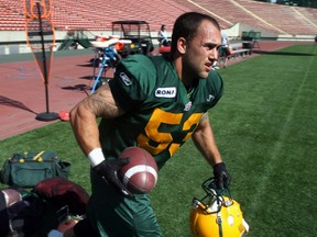 Edmonton Eskimos hopeful Ryan King of Sherwood Park, AB., makes his way on to the field at Commonwealth Stadium Friday afternoon during rookie camp. King is hoping to replace friend and mentor Taylor Inglis as the squad's long-snapper.
Perry Mah, Edmonton Sun