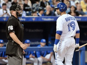 Jose Bautista has to cut the pouting and challenging umpires if he is to be the Blue Jays' true leader. (Reuters files)