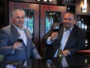 From left to right: Pasquale and Dominic Carrozza, brothers and co-owners of the family-run Trattoria Caffe Italia on Preston St. raise a glass to the beginning of the Italian Week festival on Sunday, June 3 inside their fine-dining establishment. (Matt Shumsky, Ottawa Sun)