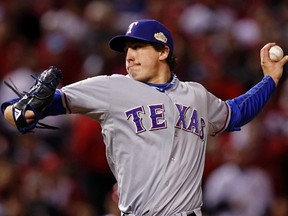 Rangers starter Derek Holland pitches has been placed on the 15-day DL due to shoulder fatigue. (JEFF HAYNES/Reuters file photo)